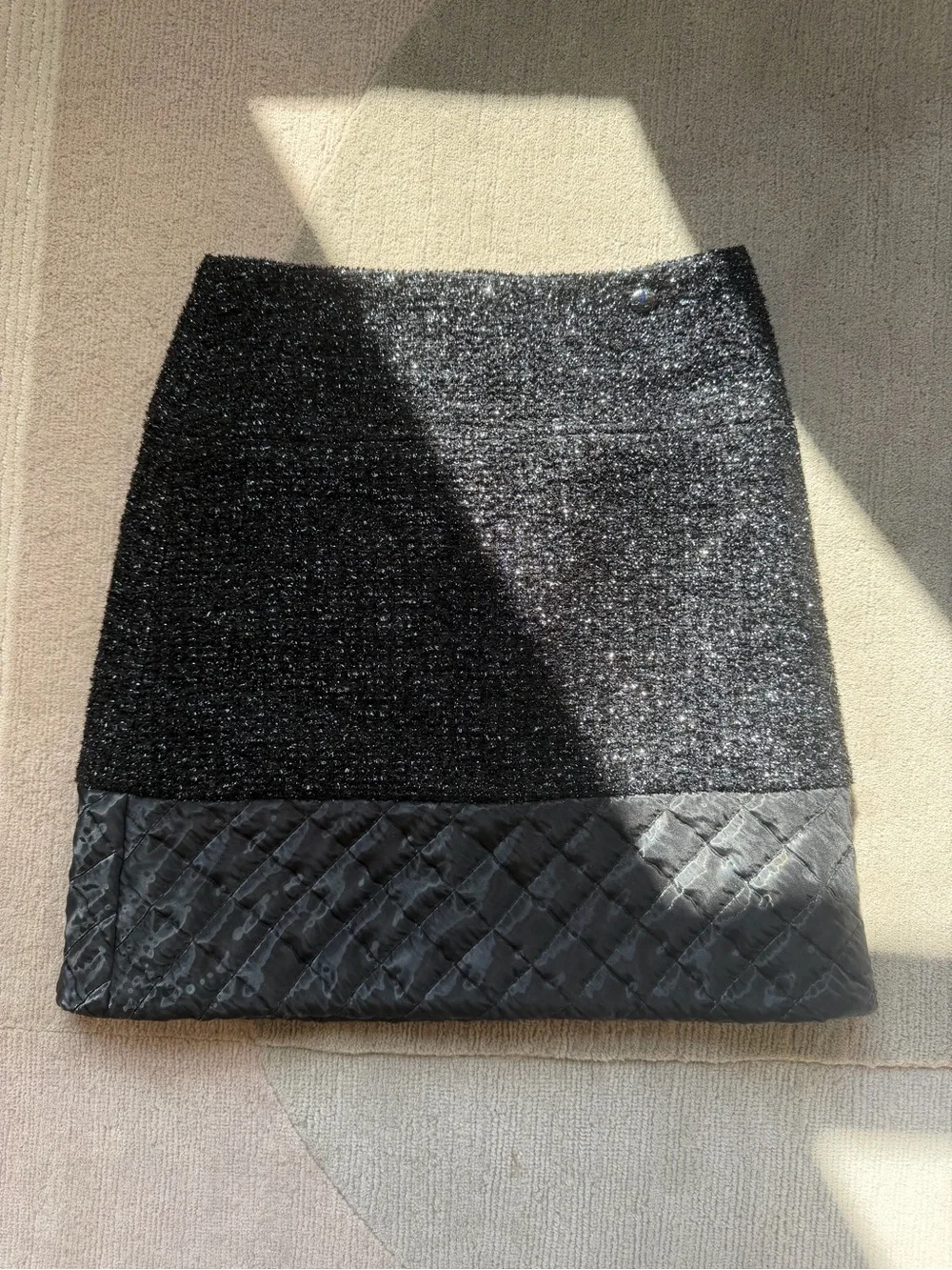CHANEL Black Sparkle Tweed Mini Skirt with Quilted Hem